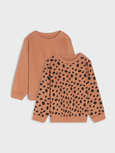 Two brown sweatshirts, one plain and one with black leopard print, on a light gray background.