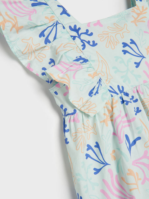 Colorful coral patterned fabric on a white background