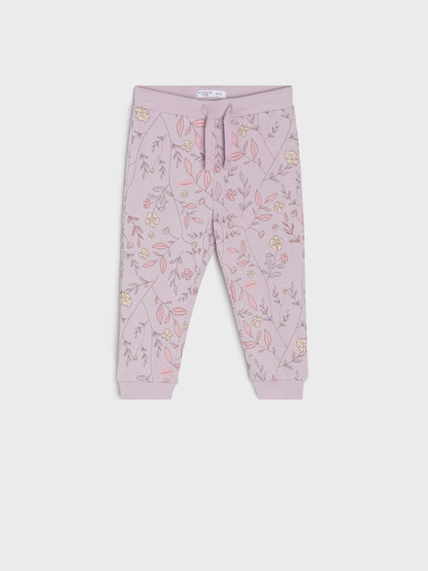 Pink pants with floral pattern on a white background
