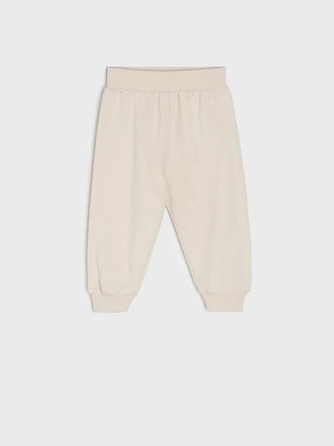 Beige pants on a white background