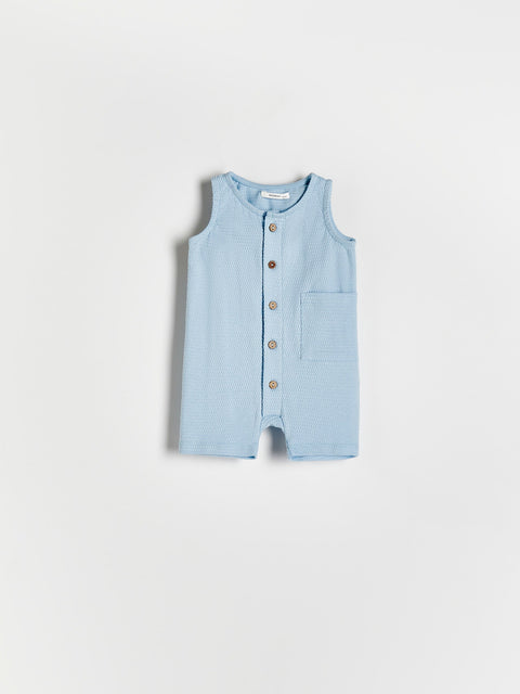Light blue sleeveless romper with buttons on a white background