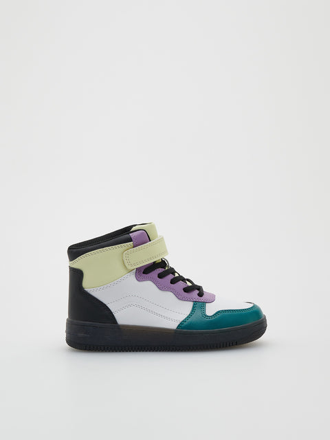 Multicolored high-top sneaker on a white background