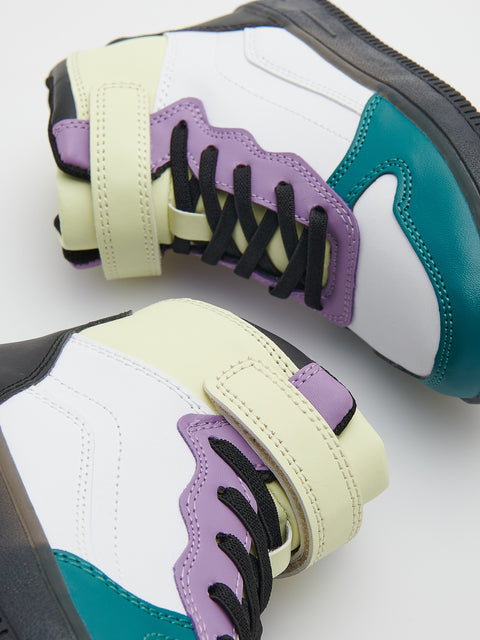 Pair of sneakers with white, purple, black, and teal colors on a light background