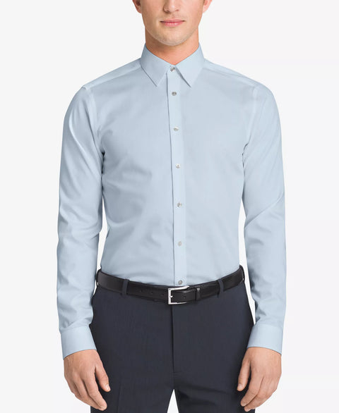 Light blue dress shirt worn by a person on a white background