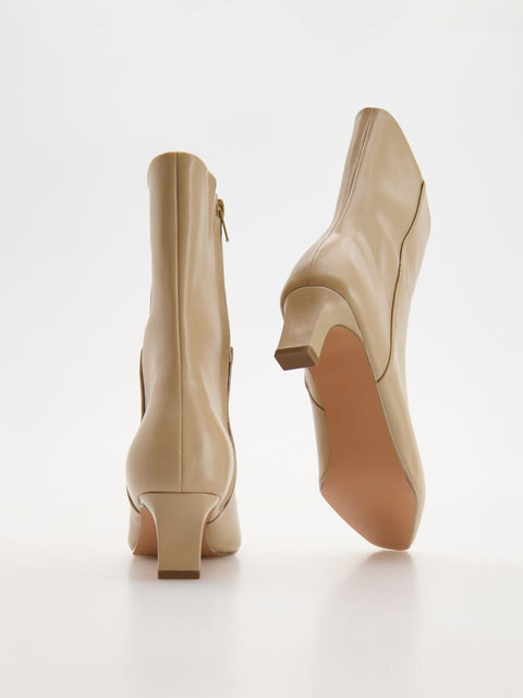 Reserved Women's Beige Leather Heeled Ankle Boots | Reserved In Lebanon