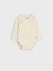 Beige baby bodysuit on a light gray background