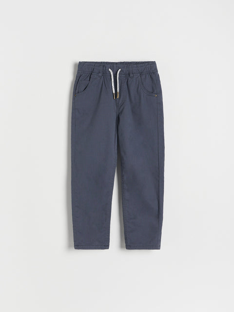 Blue pants with drawstring on a white background