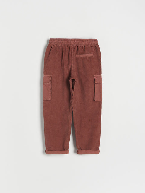 Brown cargo pants on a white background