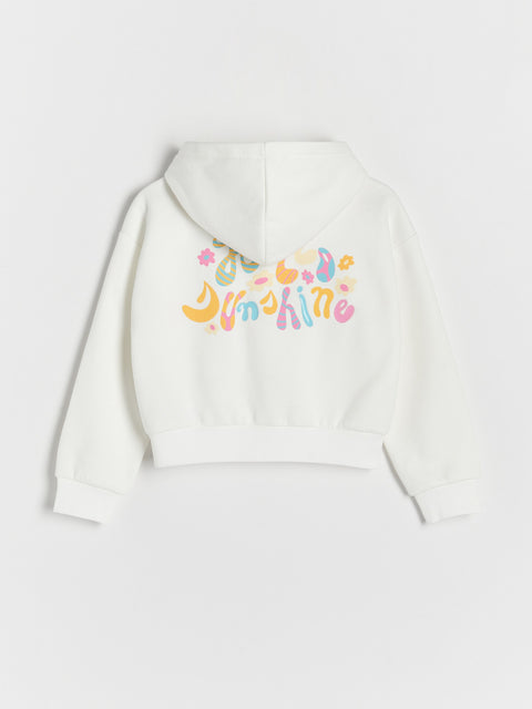 White hoodie with colorful text design on a white background
