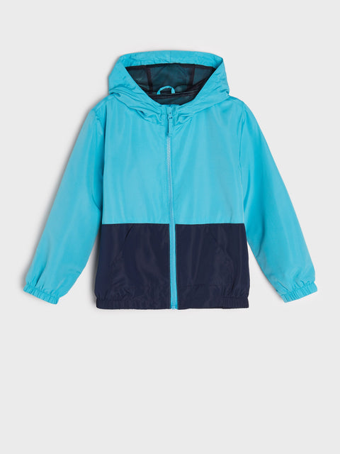 Two-tone blue jacket with a hood on a light gray background