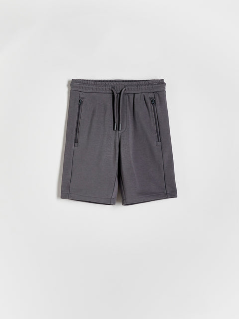 Gray shorts with drawstring on a white background