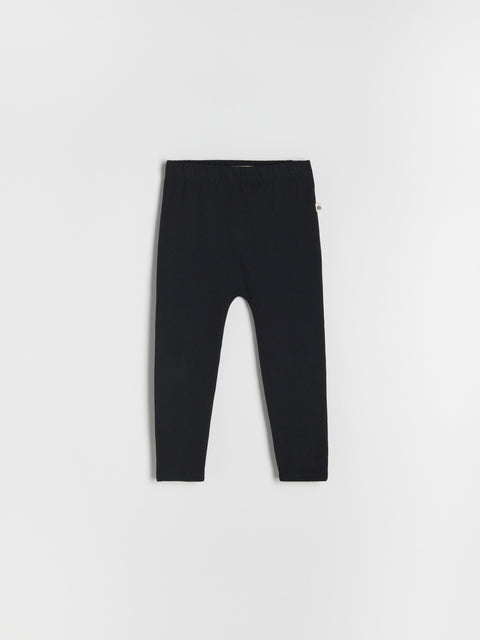 Black leggings on a white background