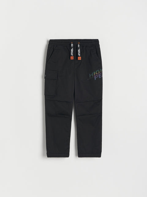 Black cargo pants with visible branding on a white background