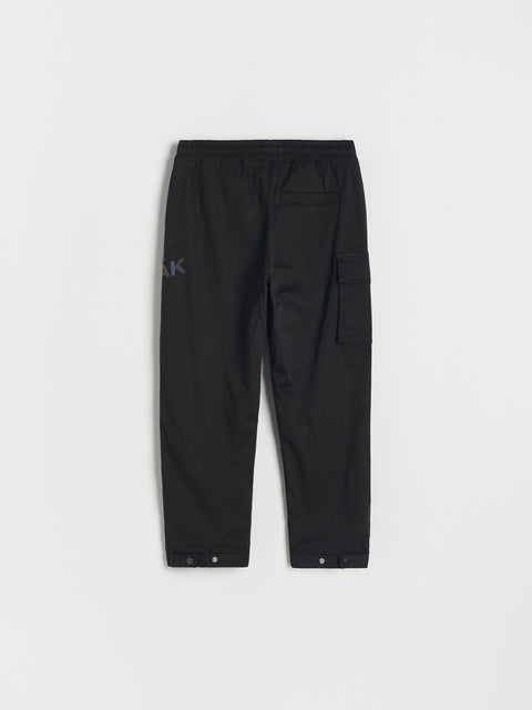 Black pants with a brand logo on a white background