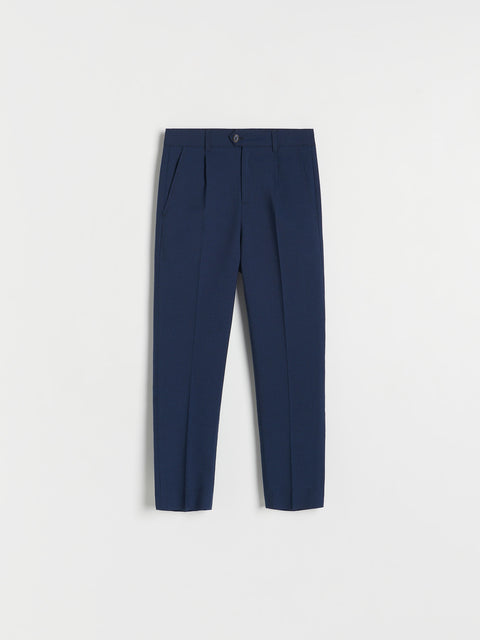 Navy blue pants on a light gray background
