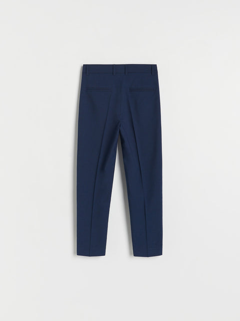 Navy blue pants on a light gray background