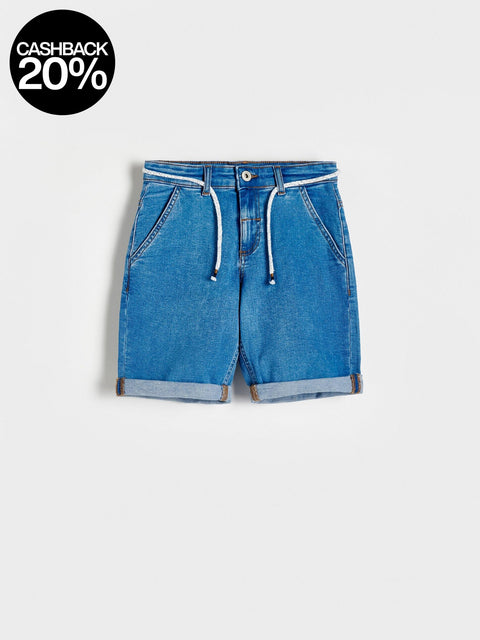 Blue denim shorts on a white background