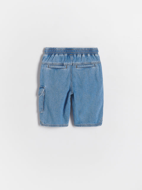 Blue denim shorts on a light gray background