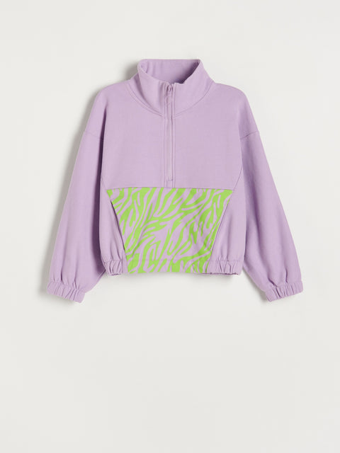Purple jacket with green zebra pattern on a white background