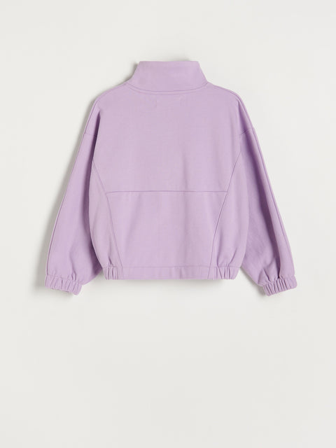 Lavender jacket on a light gray background