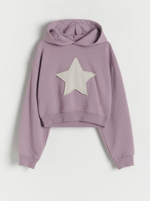 Purple hoodie with a star design on a light gray background