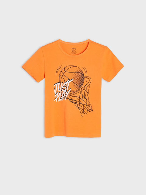 Orange t-shirt with basketball graphic and 'Just Play' text on a light gray background