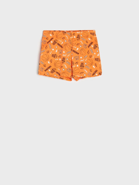 Orange boxer briefs with pattern on a white background