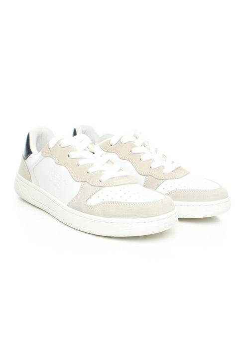 White sneakers with beige accents on a white background