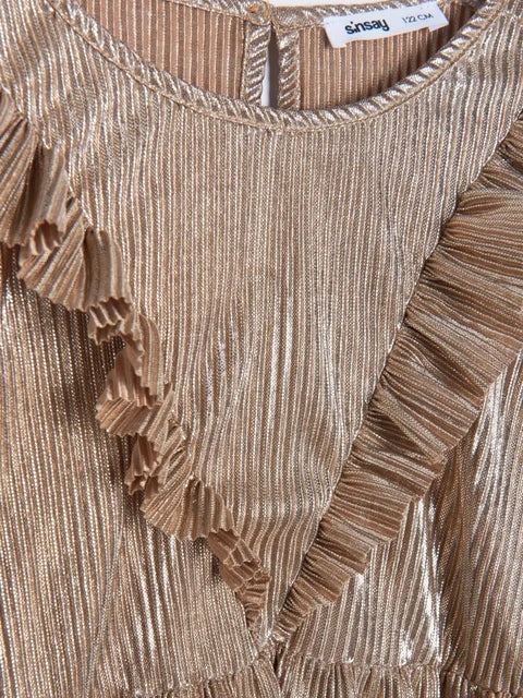 Close-up of a brown textured fabric with ruffled edges and 'simsy' label.