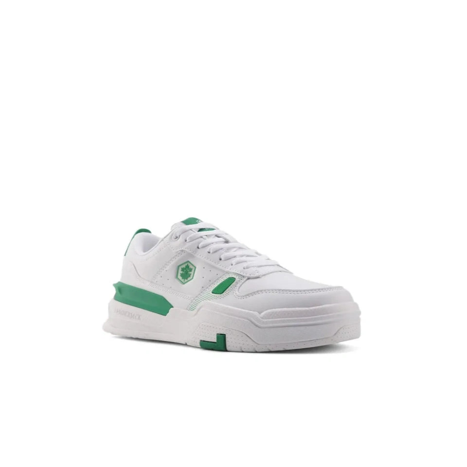 A white low-top sneaker with green accents on the side, heel, and tongue, shown from a three-quarters angle against a plain white background.