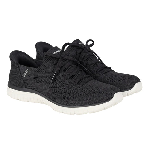 Black athletic shoes with white soles on a white background