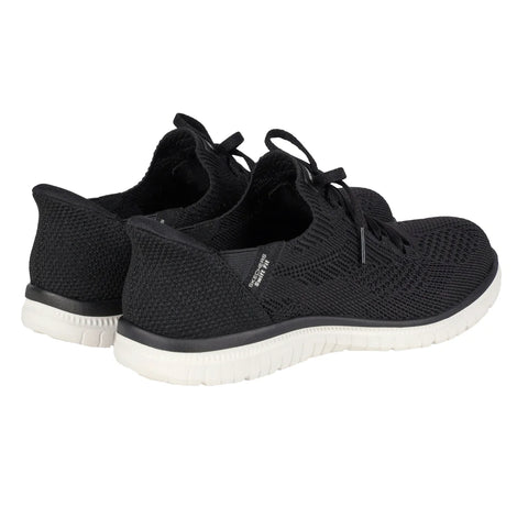 Black sneakers with white soles on a white background