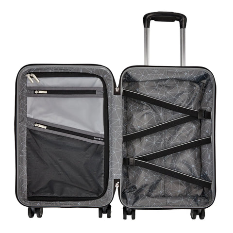 Open suitcase with geometric pattern on a white background