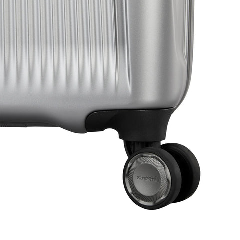 Close-up of a suitcase wheel with 'Samsonite' branding on a white background