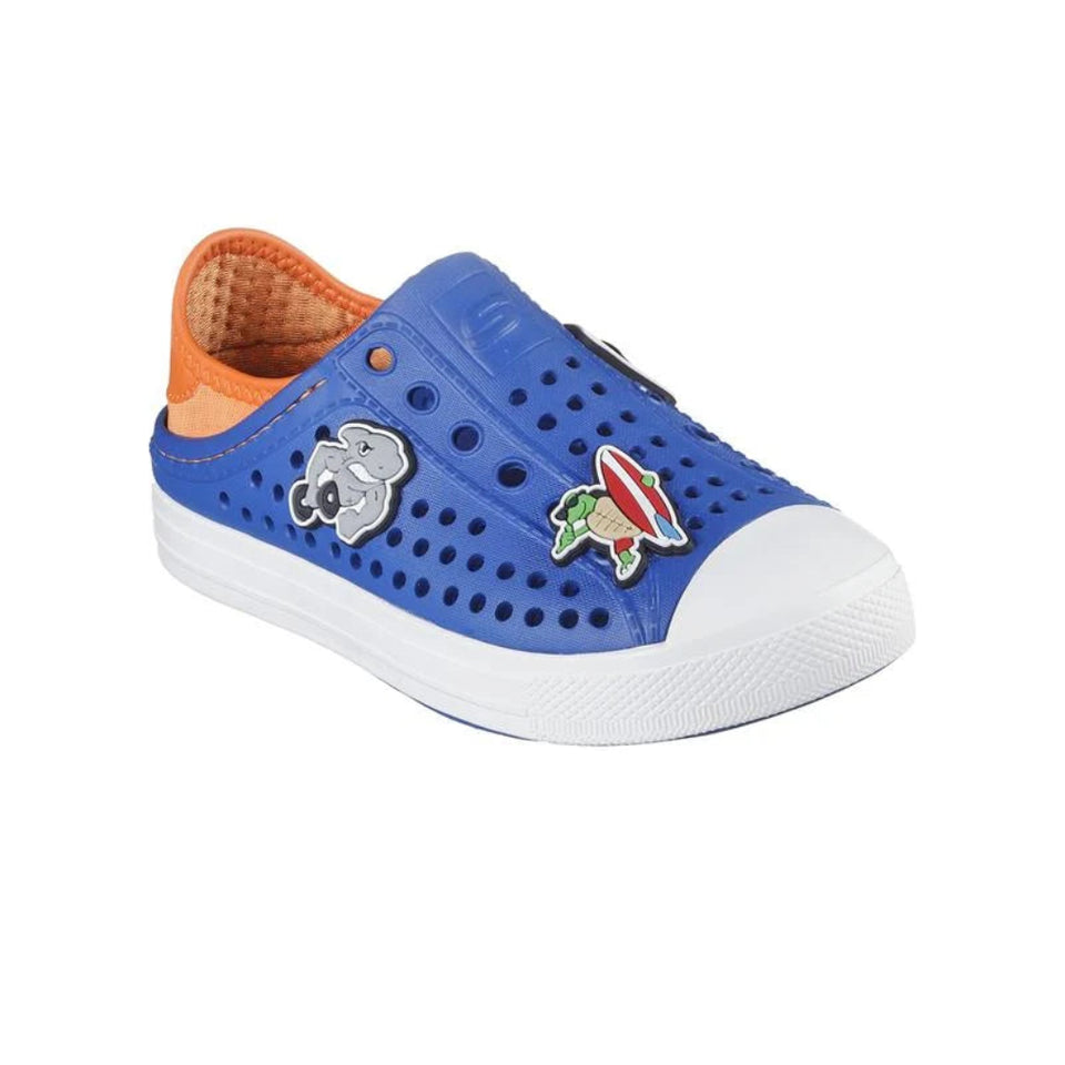 A blue perforated slip-on shoe for kids, featuring a white rubber toe cap and sole, an orange inner lining, and two cartoon charms on the side.