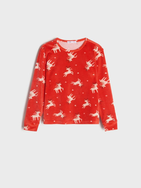 Red long-sleeve shirt with reindeer pattern on a white background