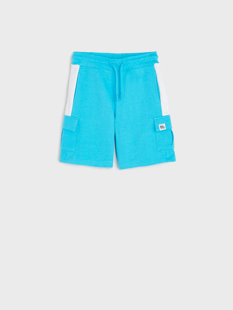 Blue shorts with a white stripe on a light gray background
