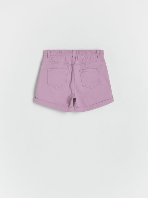 Purple shorts on a light gray background