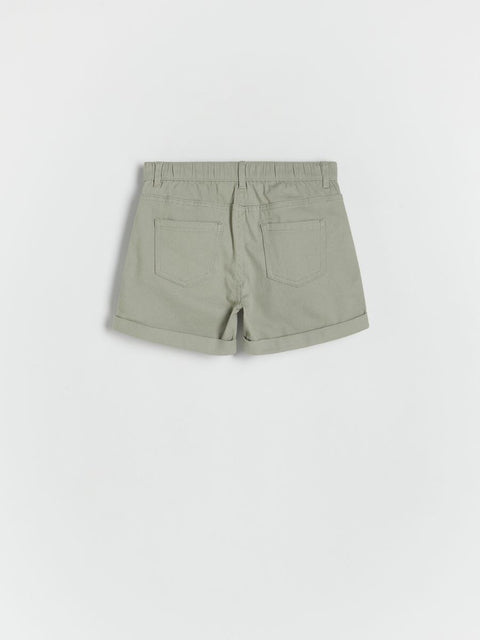 Green shorts on a white background