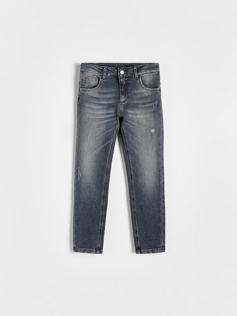 Pair of gray jeans on a white background