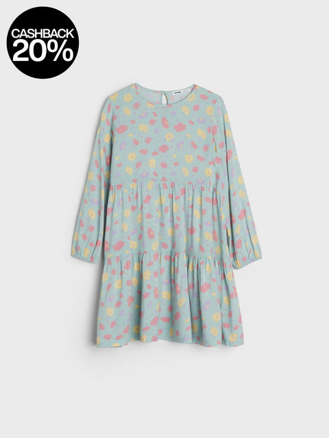 Light blue dress with colorful pattern on a white background