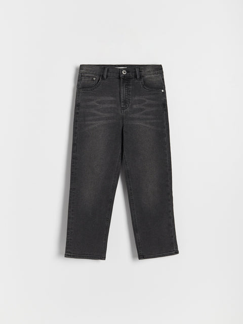 Black jeans on a light gray background