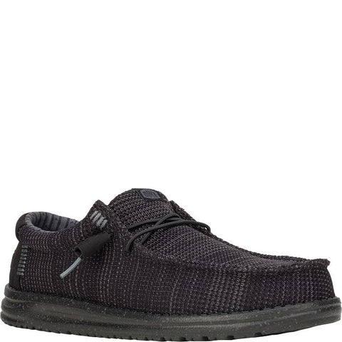 Black knit shoe on a white background