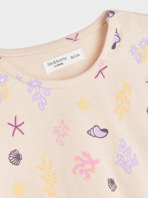 Beige garment with sea-themed pattern and 'fox & bunny' label