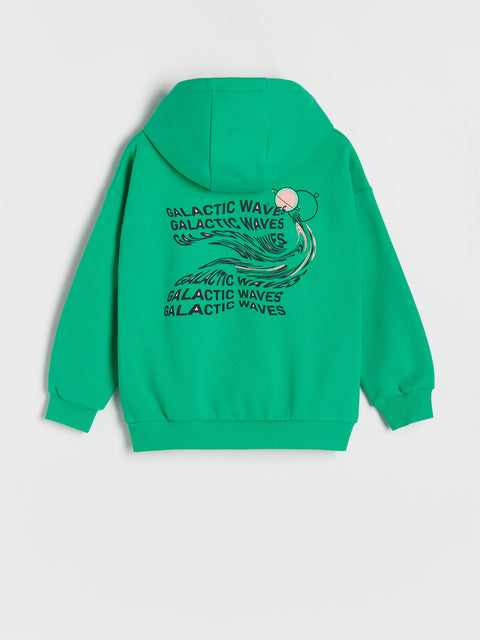 Green hoodie with 'Galactic Waves' text and graphic on a light gray background