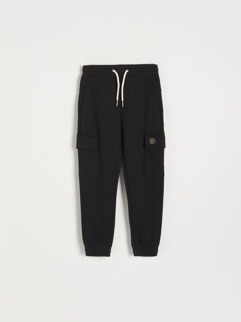 Black cargo jogger pants on a white background