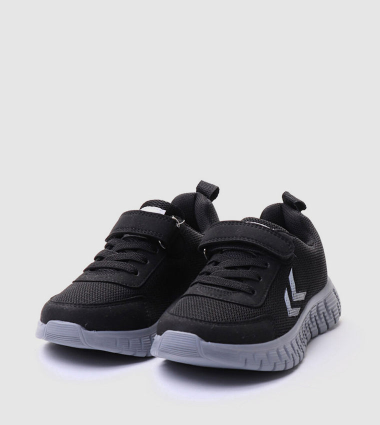 A pair of black toddler sneakers with hook-and-loop strap closures and gray soles, shown on a light gray background.