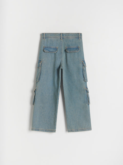 Blue denim cargo pants on a white background
