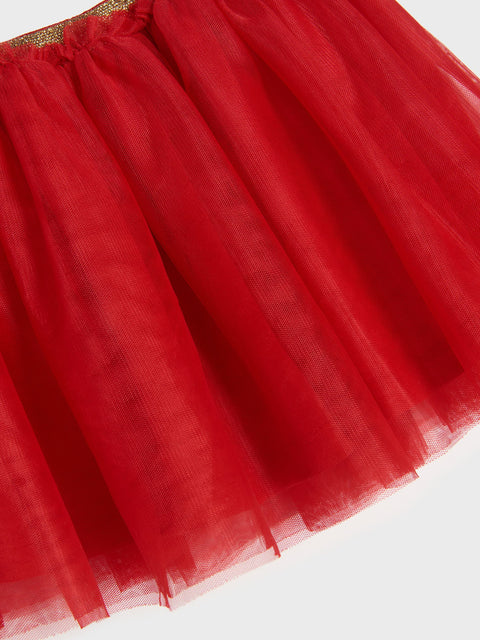 Red tulle skirt on a white background
