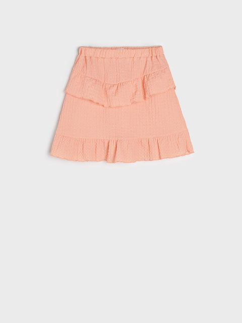 Pink skirt on a light gray background